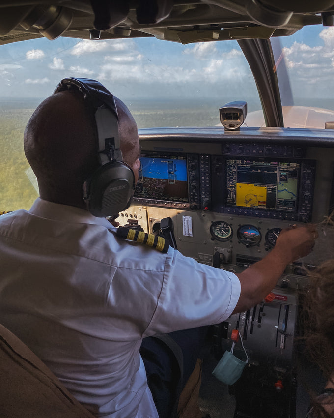 How do plane staff deal with ear pressure on a plane?