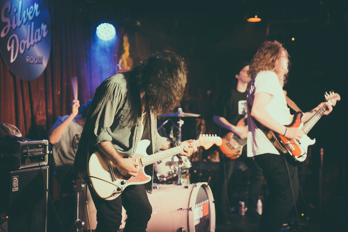 Rock Band Guitarist on Stage